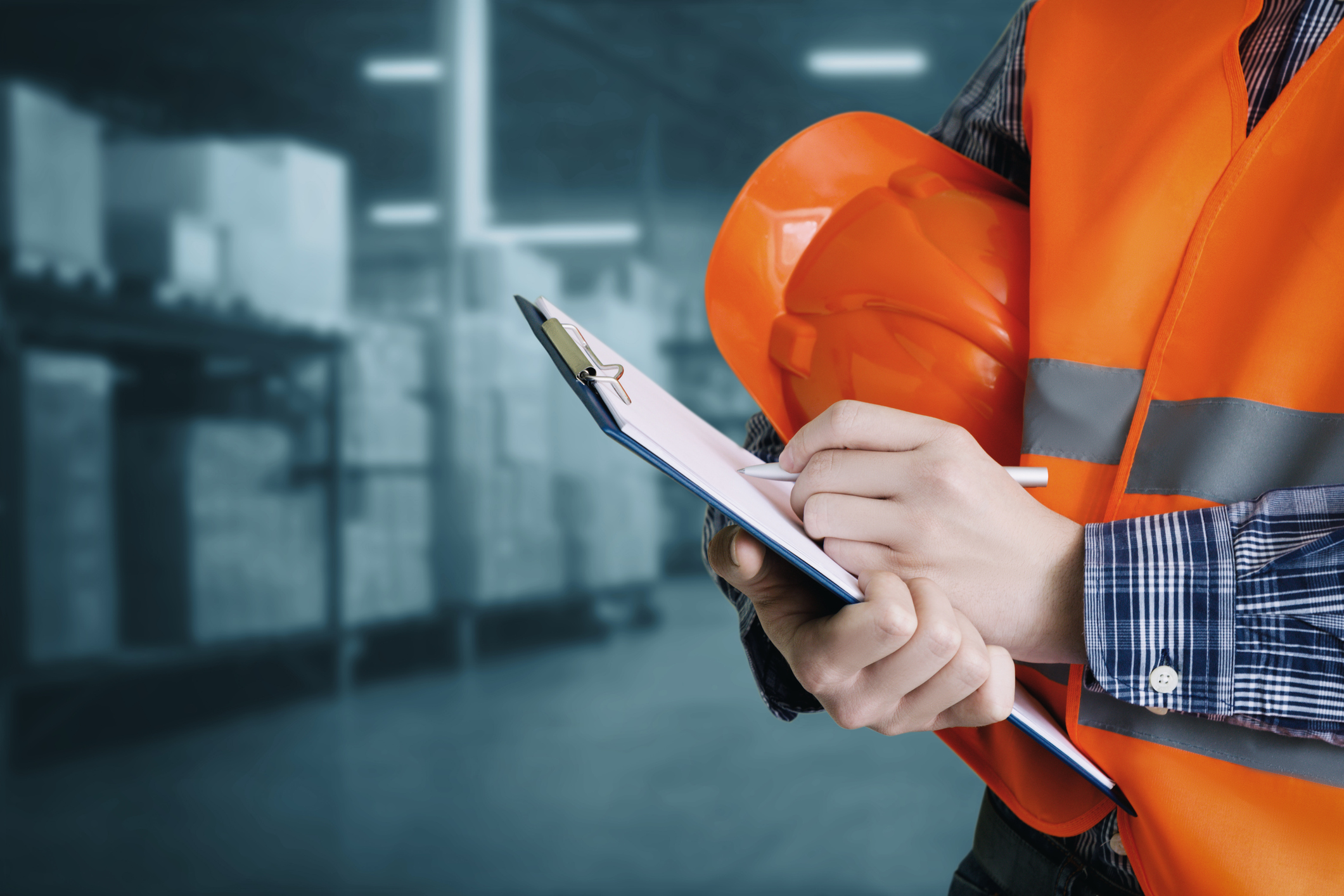Builder storekeeper makes reconciliation of goods in a warehouse.